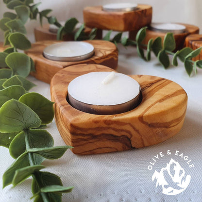 Olive wood heart tealight candle holder.